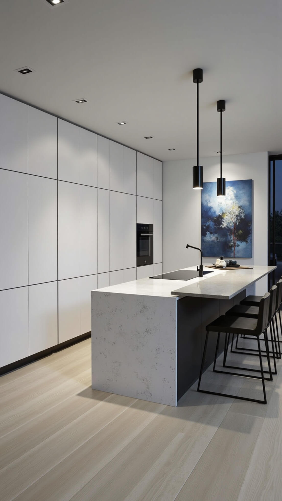 Modern minimalist kitchen with tall white cabinets, concrete waterfall island, and black accents, viewed from a low angle at dusk.
